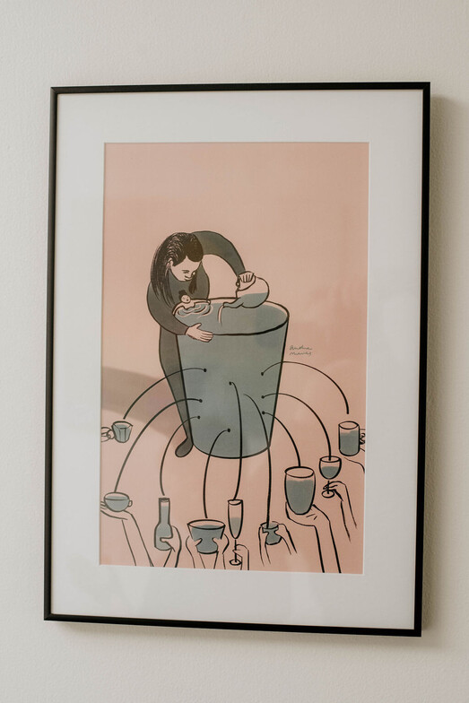 A picture of a woman "filling her cup."  Prioritizing her well-being so she can share with others.