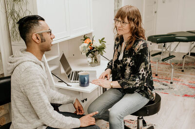 Chiropractic consultation done by chiropractor at Vivid Health Toronto with a male patient.